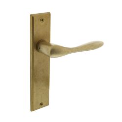 Deurkruk Banaan met schild blind messing getrommeld
